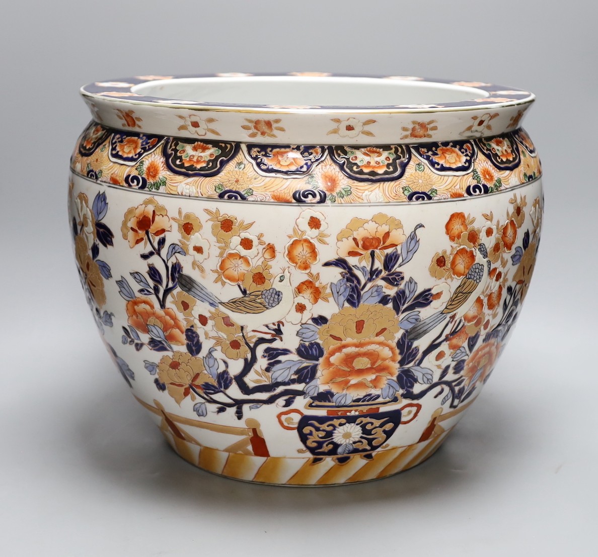 A late 20th century Chinese Imari fish bowl, 31 cms high